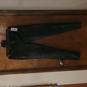 Black skinny jeans with floral design on the front